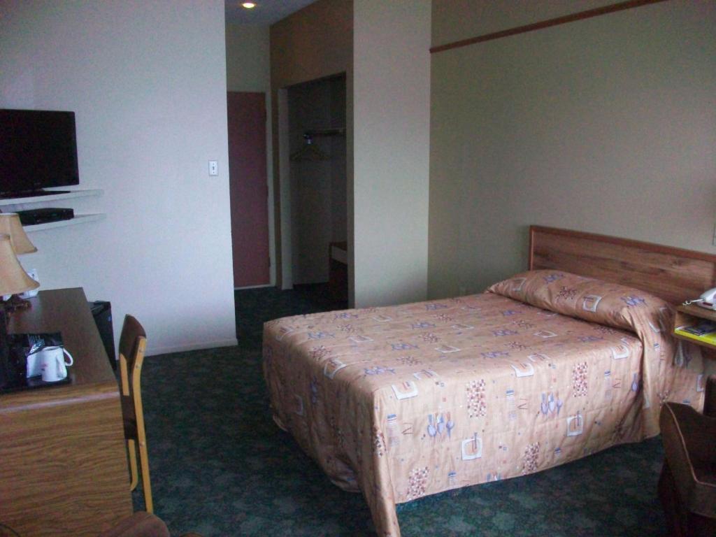 Motel Princesse Saguenay Quarto foto