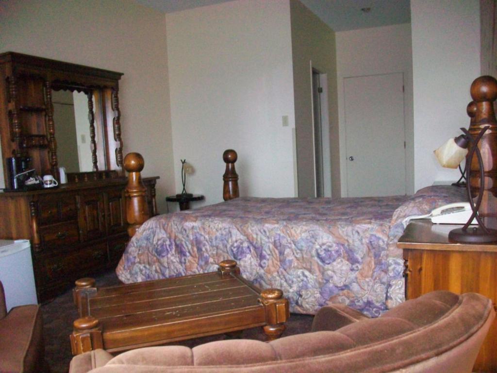 Motel Princesse Saguenay Quarto foto