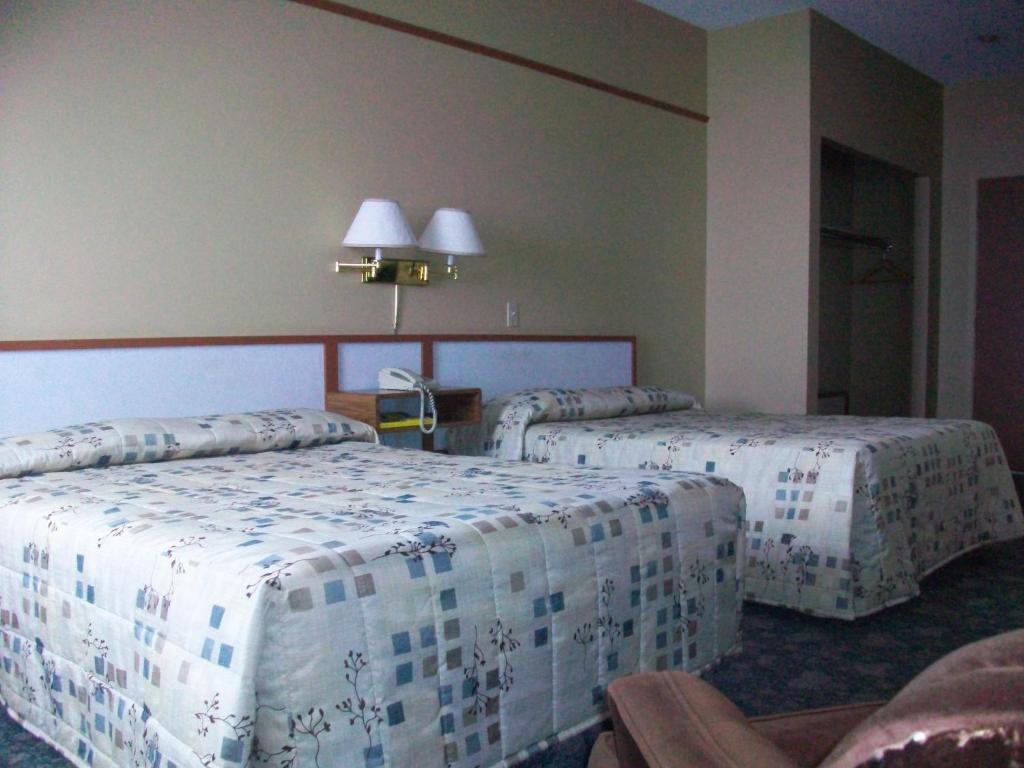 Motel Princesse Saguenay Quarto foto