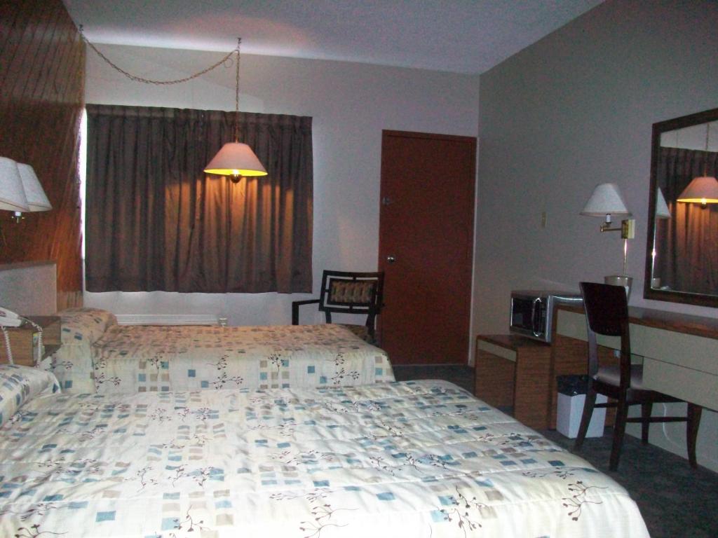 Motel Princesse Saguenay Quarto foto